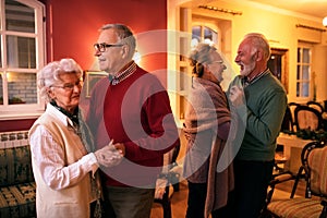 Two senior couple dancing romatic at nursing home