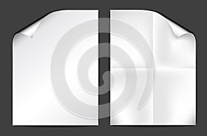 Two sheets of white paper on dark background