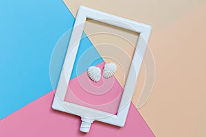 Two Shell and Photo Frame tilted set on Pastel background