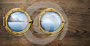 Two ship windows with tropical sea or ocean island