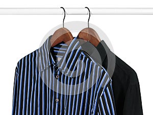 Two shirts on a rack