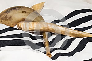Two shofar with shawl (talit In Hebrew) photo