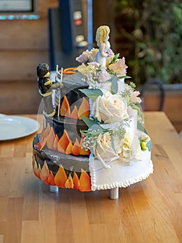 Two side Firefighter beautiful delicious Wedding cake in many with fresh wild flowers save the girl