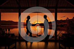 two silhouettes practicing wing chun in a sunset-lit dojo