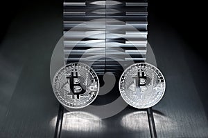 Two Silver Bitcoin crypto currency stand