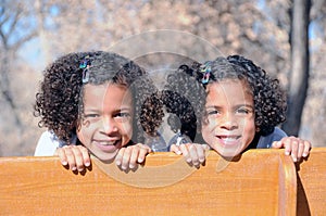 Two sisters on bench