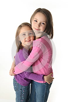 Two sisters hugging