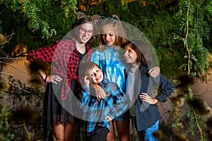 Two Sisters Look Down on their Obviously Confused Little Brother photo