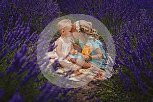 two sisters on a picnic in a lavender field