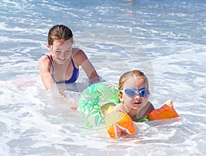 Two sisters playing in the sea, Nice