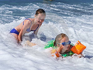 Two sisters playing in the sea, Nice