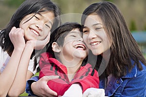 Two sisters and their disabled little brother