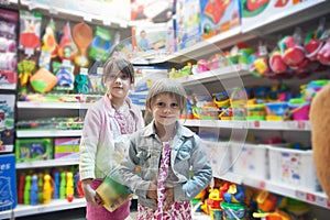 Two sisters in toy store