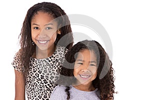 Two sisters on white background photo