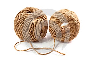 Two skeins of jute twine on white