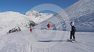 Two Skier Woman Skiing Carving Style On The Mountain Slope In Winter