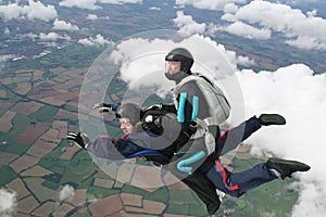 Two skydivers in freefall photo