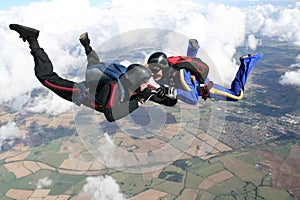 Two skydivers in freefall