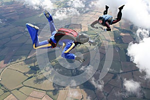 Two skydivers in freefall