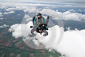 Two skydivers having fun photo