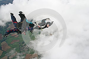 Two skydivers having fun