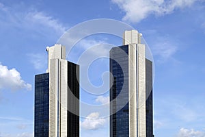 two skyscrapper blocks in open sky photo