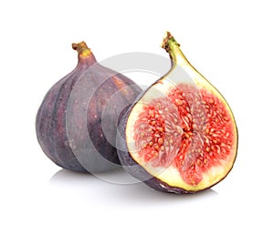 Two sliced figs isolated on white background