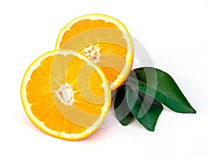 Two sliced oranges close-up on te white background