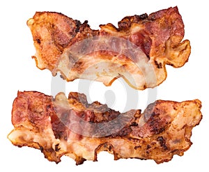 Two slices of fresh fried bacon isolated on a white background