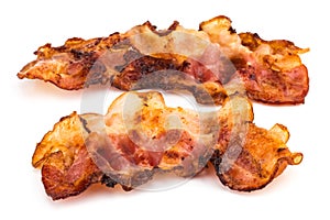 Two slices of fresh fried bacon isolated on a white background