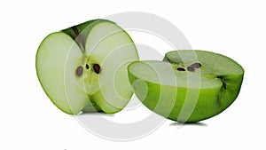 Two slices of green Apple on a white background.