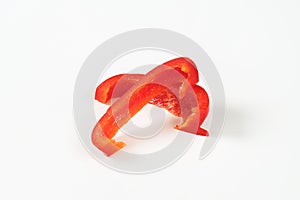 Two slices of red bell pepper