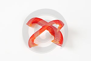 Two slices of red bell pepper