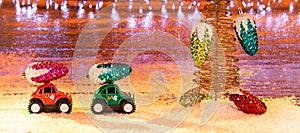 Two small all-terrain vehicles, transporting Christmas decorations