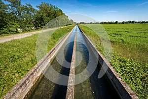 Two Small Concrete Irrigation Canals in the Countryside - Padan Plain Italy