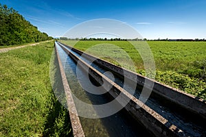 Two Small Concrete Irrigation Canals in the Padan Plain - Lombardy Italy