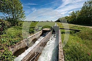 Two Small Concrete Irrigation Canals a Rural Scene - Padan Plain Italy