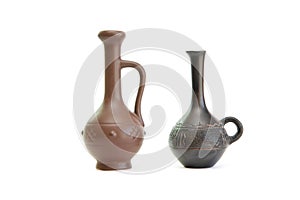 Two small elegant jugs isolated