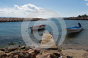 Two small fishing boats in the harbour