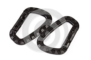 Two small plastic snap hooks on a white background