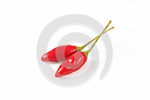 Two small red chili peppers