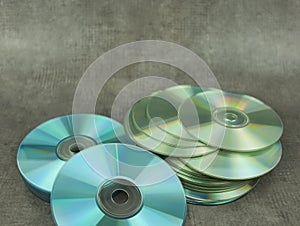 Two small stacks of recordable CDs