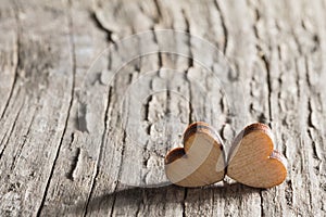 Two small wooden hearts