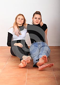 Two teenage girls smiling friends photo