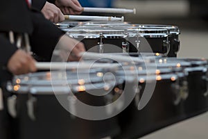 Two snare drummers warming up before the bands performance