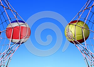 Two soccer balls in flags Costa rica and Spain