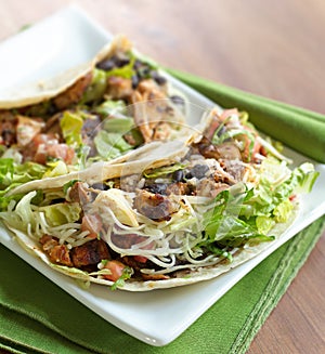 Two soft shell chicken tacos