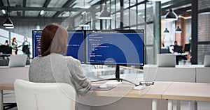 Two Software Developers Coding On Computers