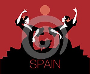 Two Spanish flamenco dancers dancing typical Spanish dance
