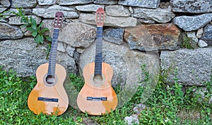 Two spanish guitars in the gound